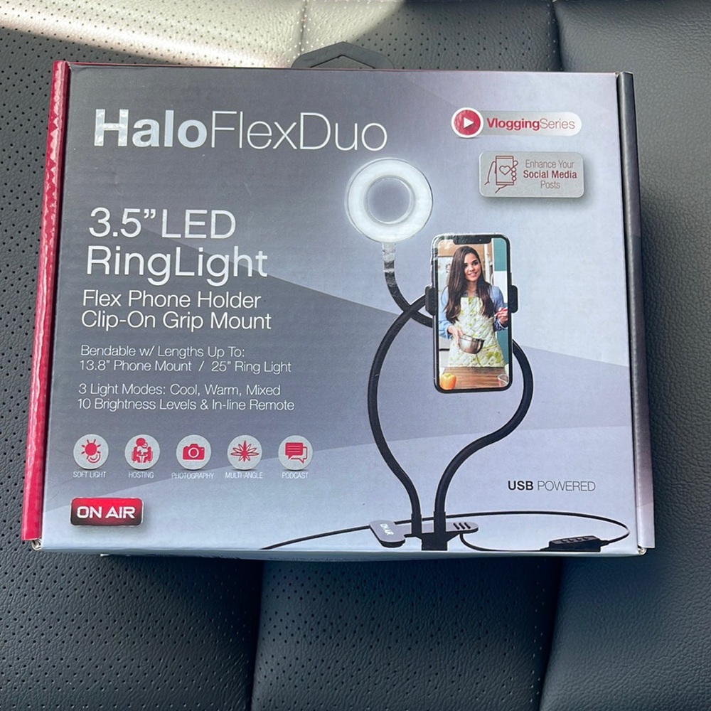 Phone holder with led light for better lighting on pictures or videos